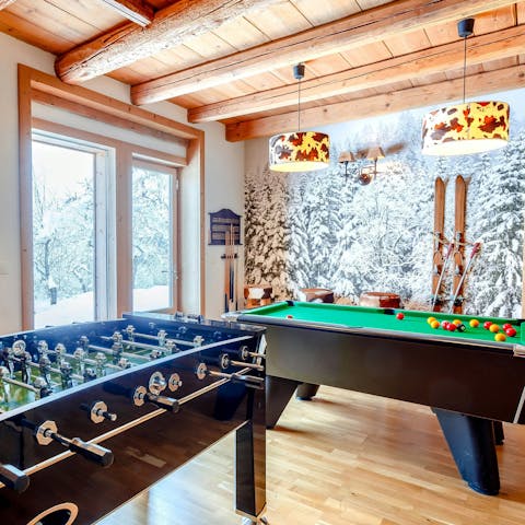 Get competitive with a round of pool or table football in the games room