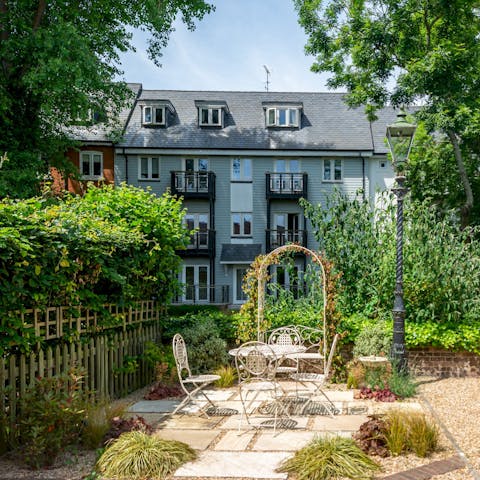 Soak up the sun from the terrace as you listen to the river running by