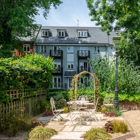Soak up the sun from the terrace as you listen to the river running by