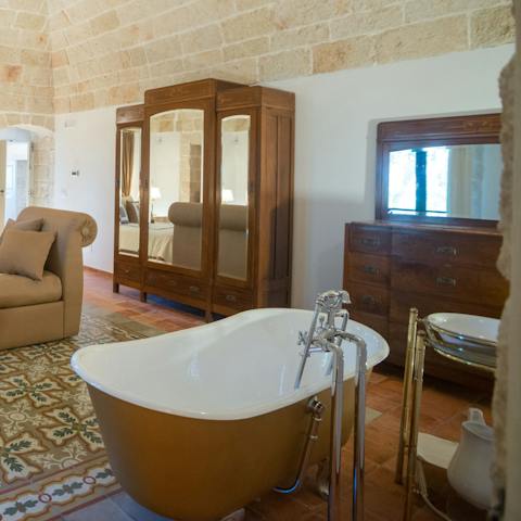 Relax and restore your senses with a long soak in the in-room freestanding bath