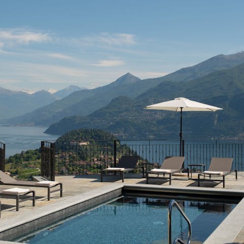 Lounge by the pool and admire the sweeping lake views