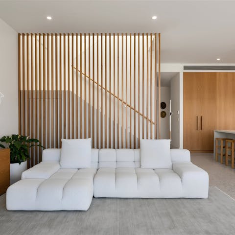 Enjoy a lager in the stylish living room