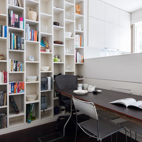 Enjoy your morning coffee in the library-backed dining area