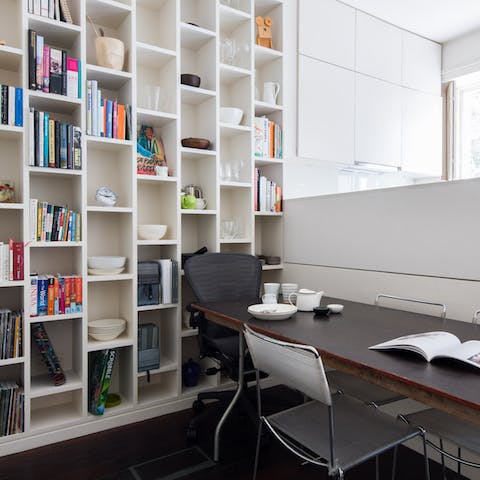 Enjoy your morning coffee in the library-backed dining area