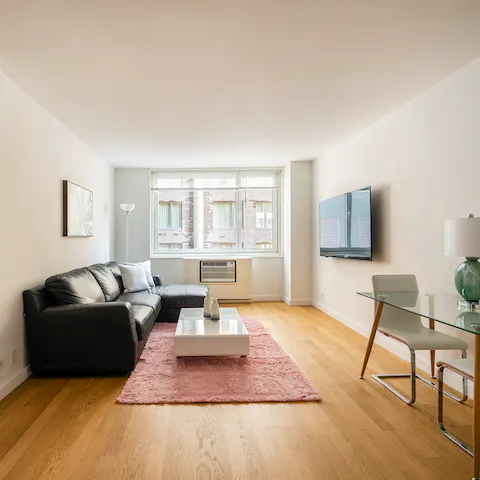 Enjoy a light-filled living room courtesy of big windows