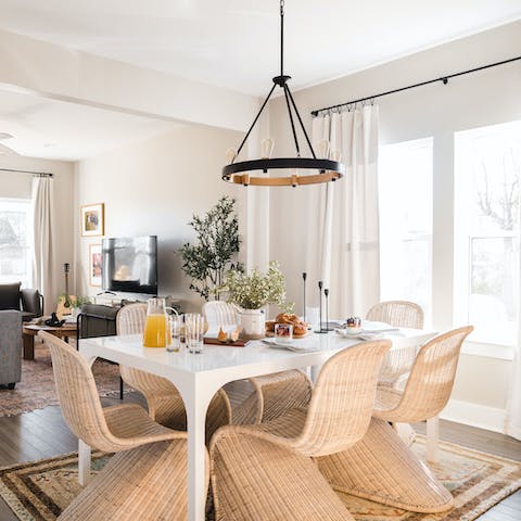 Enjoy social mealtimes in the elegant, light-filled dining space