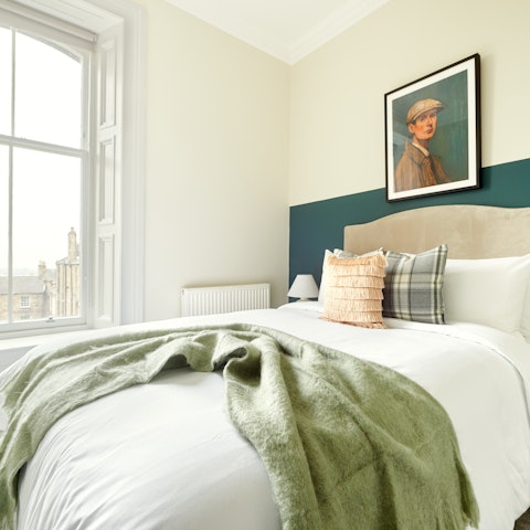 Watch city life unfold from your bedside with a coffee