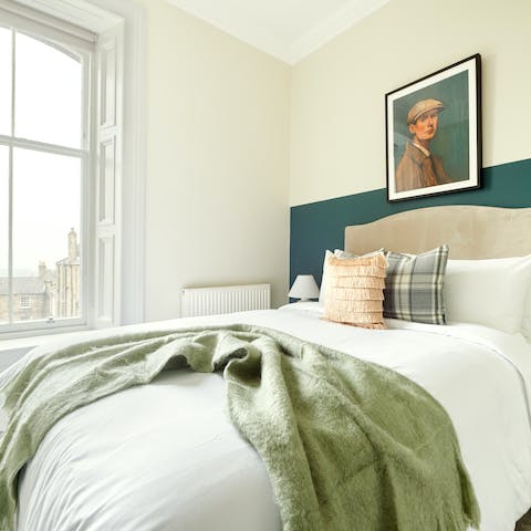 Watch city life unfold from your bedside with a coffee