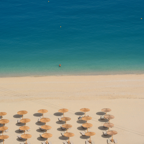 Take the fifteen-minute walk down a direct footpath to gorgeous Lourdas beach