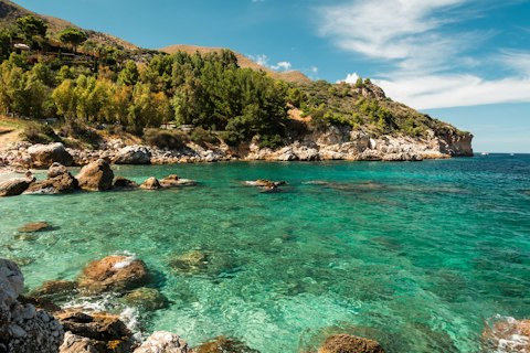 Discover Sicily's protected coastal reserves with crystalline water and rich wildlife