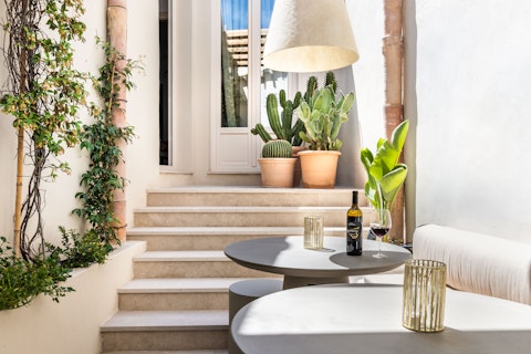 Uncork a bottle of wine in the private, sun-warmed courtyard