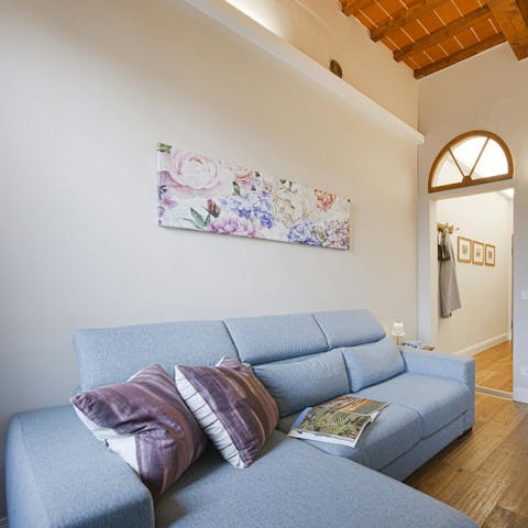 Sip a morning espresso or an evening Prosecco on the comfy sofa