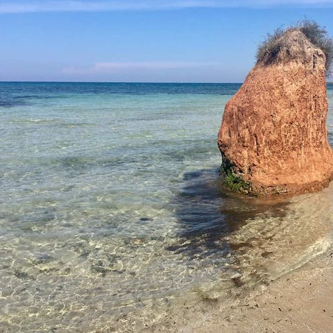Soak up the sun from Spiaggia di Torre Guaceto, a short drive away