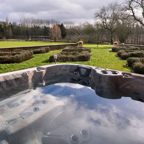 Soak in the outdoor hot tub