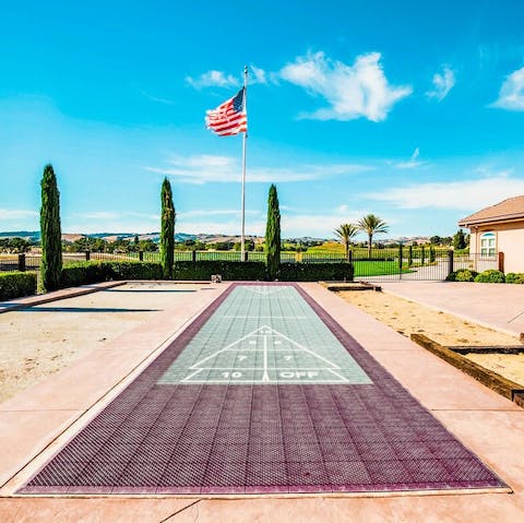 Try your hand at bocce ball and shuffleboard in the sunshine