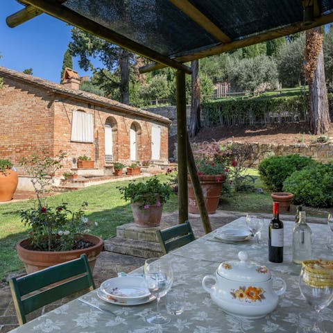 Savour fresh bruscetta and red wine on the terrace