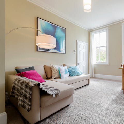 Cosy up on the huge couch after a long day