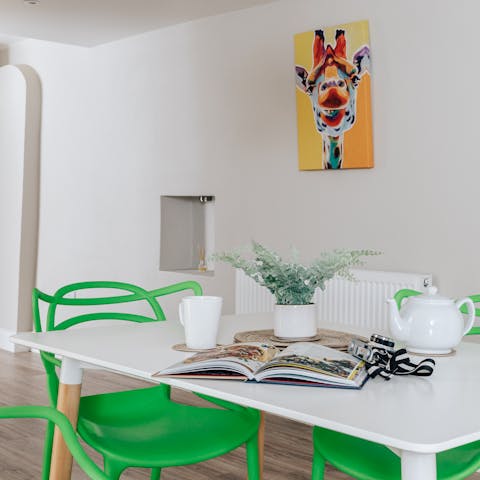 Start the day with breakfast around the dining table before setting off on a seaside adventure
