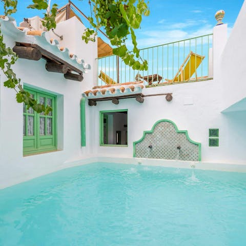 Cool off in the courtyard swimming pool on summer days