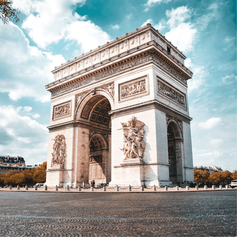 Experience the buzz of Paris with a stroll to the Arc de Triomphe