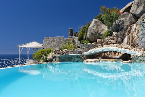 Admire sea views as you swim in the private pool