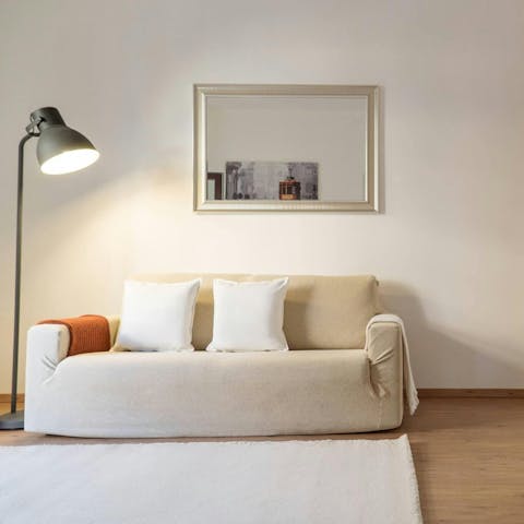 Rest up in the bright living area after sightseeing