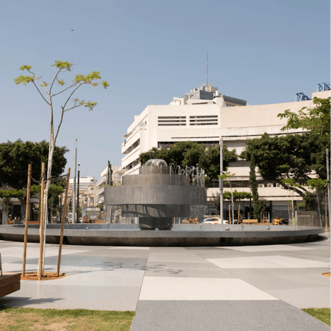 Take a seat and admire the fountains at the centre of Kikar Dizengoff, eight minutes' walk away