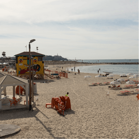 Pack a picnic and head down to Trumpeldor Beach in only nine minutes on foot