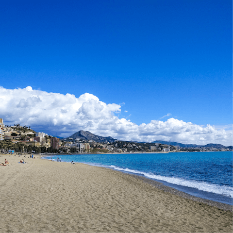 Treat yourself to an afternoon at Malagueta Beach, a quarter of an hour away on foot
