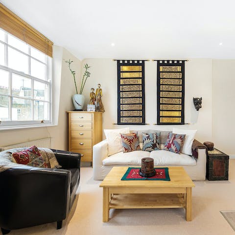 Take in the interesting objets d’art as you relax in the living room