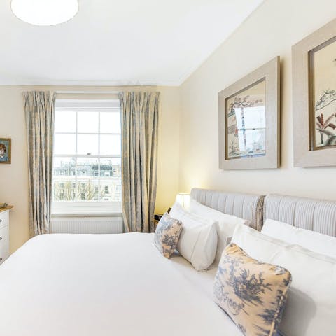 Enjoy a blissful night's sleep in the charming bedroom