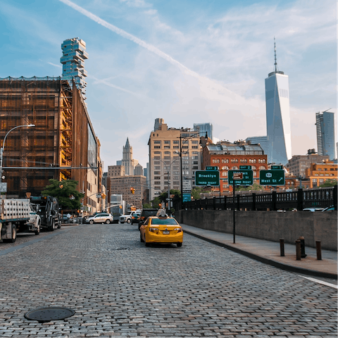 Explore Tribeca's cobblestone streets lined with fashionable boutiques and hip restaurants