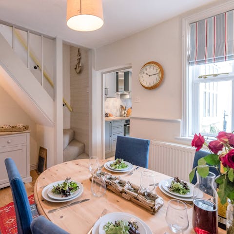 Gather at the brightly-lit dining table for Sunday lunch