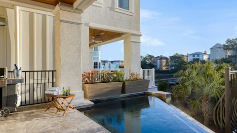 Cool off in the infinity pool with coastal views beyond