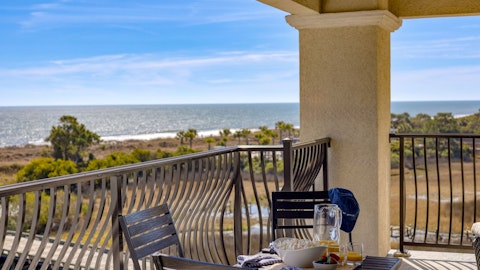 Take breakfast on the balcony as the Atlantic glitters below