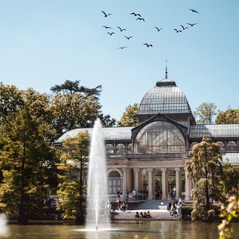 Take a refreshing stroll through El Retiro Park – just an eleven–minute walk away
