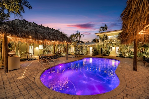 Enjoy a magical sunset swim in the communal pool