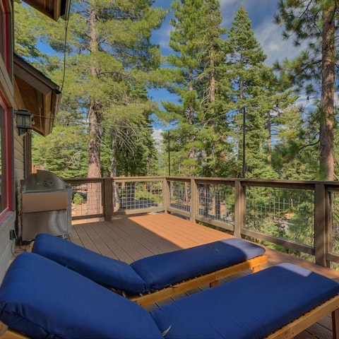 Soak up the sunshine and forest views on the balcony