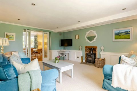 Cosy up by the wood burner on cooler evenings