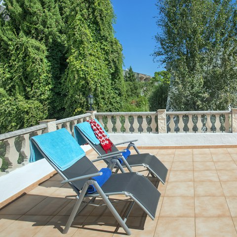 Relax with a sundowner on the terrace after a busy day spent exploring