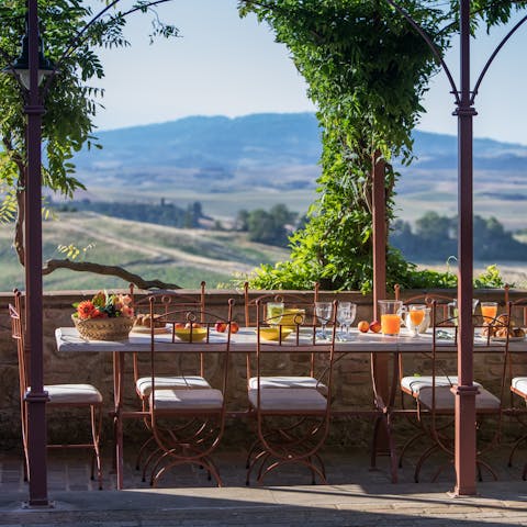 Dine alfresco and admire stunning Tuscan countryside views