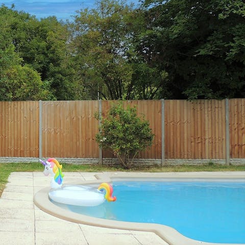 Enjoy a cooling dip in the refreshing outdoor pool