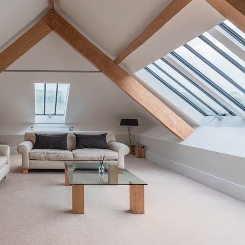 Head up to the mezzanine and gaze out through the large skylight