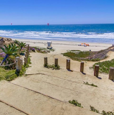 Hop down to Law Street Beach – just steps from the home