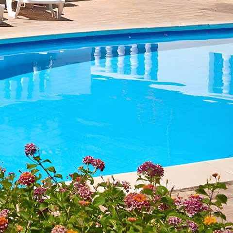 Swim gentle laps in the private swimming pool