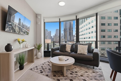 Sit among floor-to-ceiling windows with downtown Miami all around