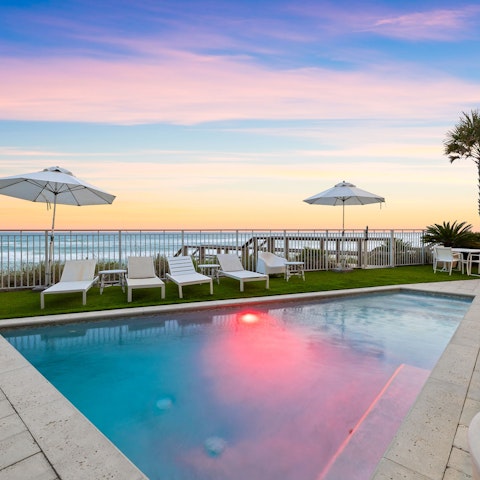 Enjoy views of the sunset from the edge of the private pool