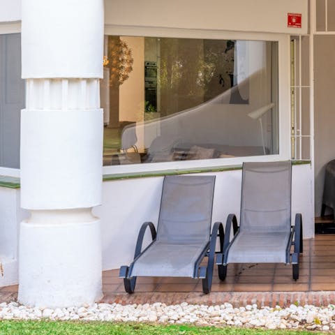 Soak up the Malaga sunshine from the terrace sun loungers