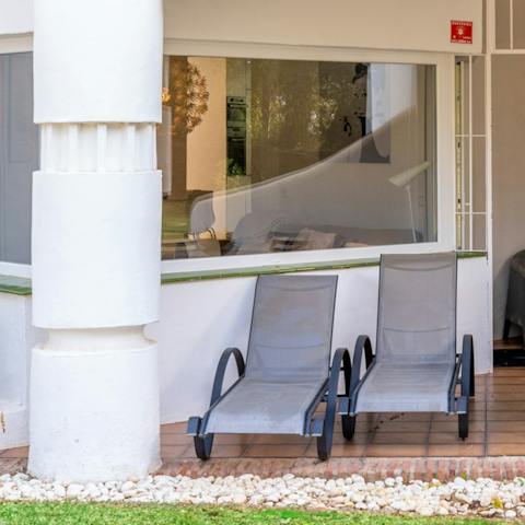 Soak up the Malaga sunshine from the terrace sun loungers
