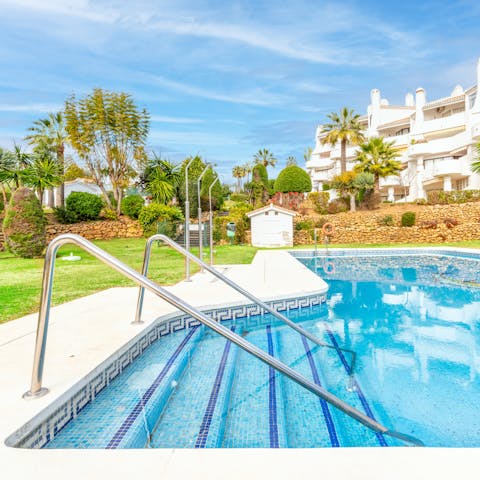 Swim gentle laps in the communal swimming pool